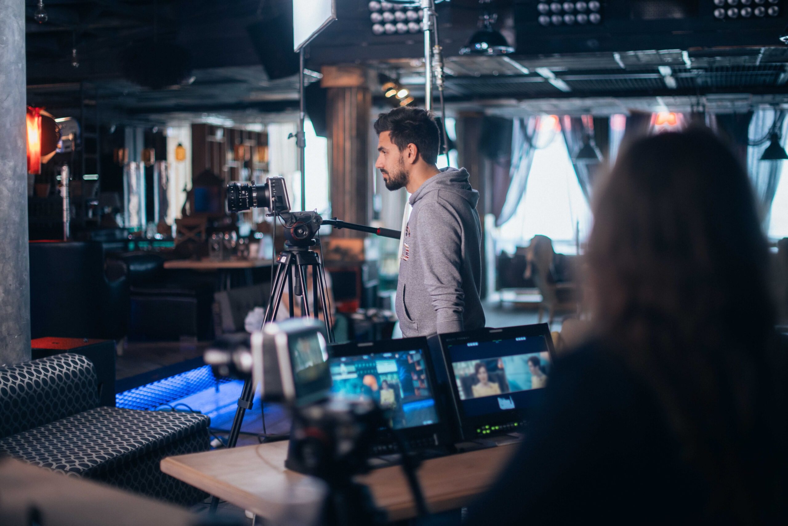 Film set, monitors and modern shooting equipment. Film crew, lighting devices, monitors, playbacks - filming equipment and a team of specialists in filming movies, advertising and TV series